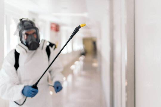 Worker Disinfecting Hospital
