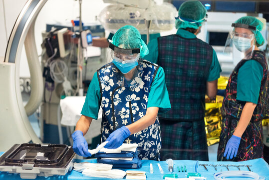 Portrait of Nurse Preparing Equipment