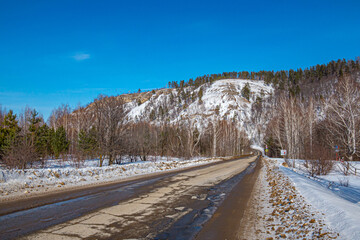 Winter road in the low mountains