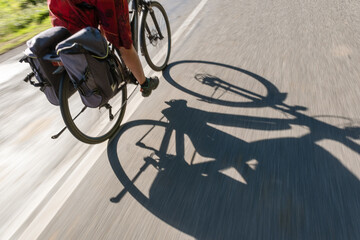 cyclist and its shadow