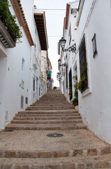 ALTEA, SPAIN - AUGUST 11, 2012: The maze of cobbled narrow and crooked streets in Altea town.