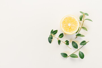 Lemon . Ripe lemons and lemon leaves on white background. Top view 