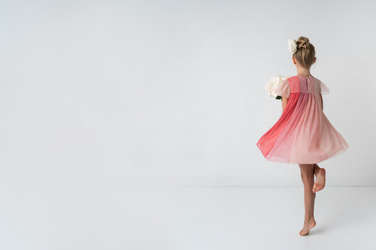 Girl Twirling Her Dress