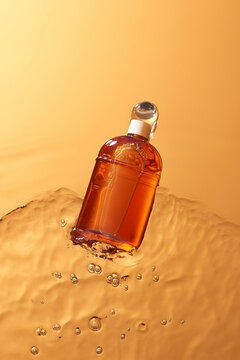 Shampoo bottle floating on the water.