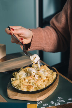 Baked Macaroni In Sauce With Grated Cheese.