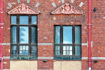Windows with bas-relief.