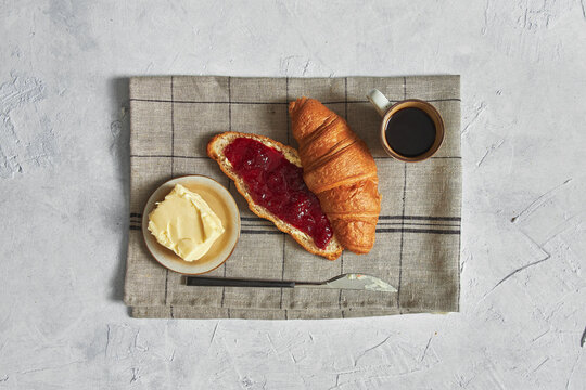 Soft Butter Croissant With Homemade Strawberry Jam.