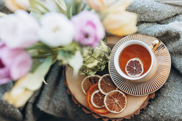 top view still life vase of flowers and a cup of coffee