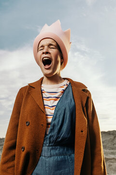 Creative Fashion portrait of Trendy teen model shouting loudly