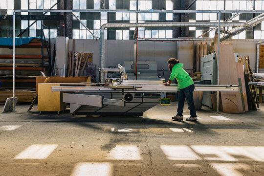 Hispanic Man at work in Workshop