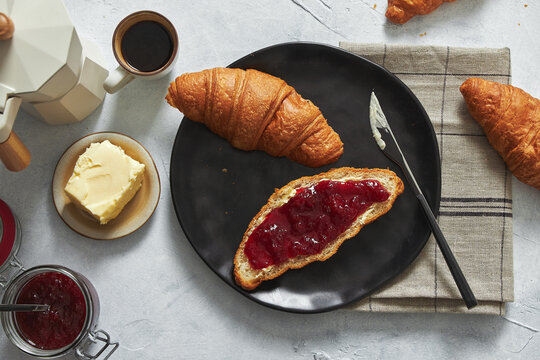 Soft Butter Croissant With Homemade Strawberry Jam.