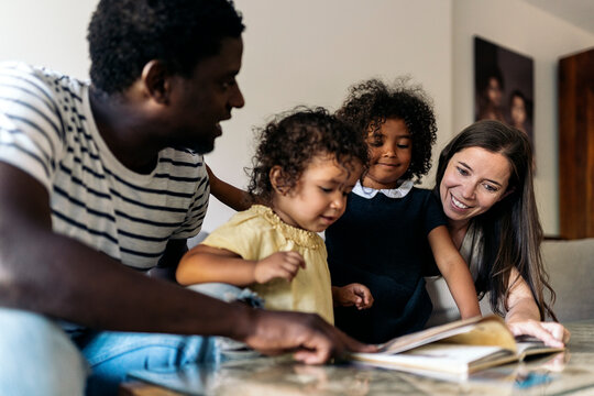 Adorable multiethnic Family at Home