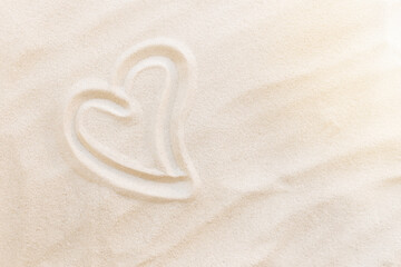 Fototapeta na wymiar Travel, vacation, honey moon concept. Heart shapes on the sand. Love for two