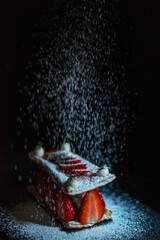 Icing sugar on a cake