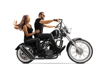 Fototapeta na wymiar Young man and woman on a chopper motorbike