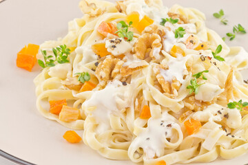 Tagliatelle pasta with walnuts and gorgonzola cheese sauce series picture 01