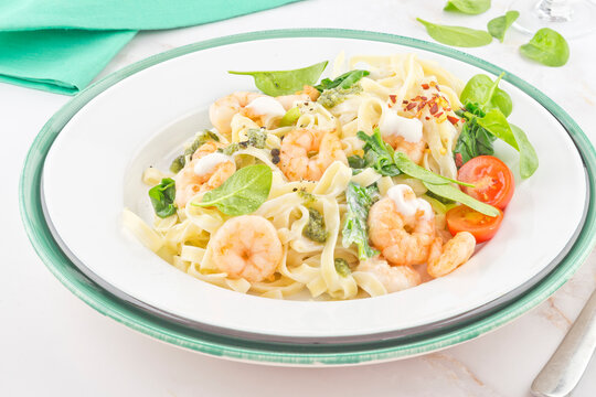 Pasta tagliatelle with prawns and spinach cream sauce series image 02