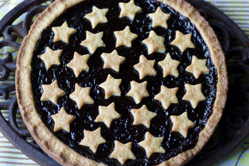 delicious plum jam cake decorated, view from above