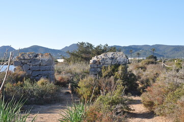 Stone ruins in the rural path of Can Blai, Ibiza.
