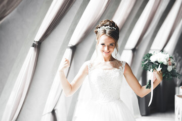 Beautiful luxury bride in elegant white dress