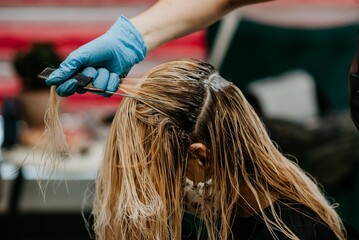 hairdresser with dryer salon blonde brunette