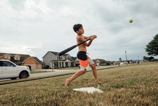 Summer evenings playing baseball in the yard.