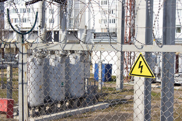 Electrical substation.Electric lines on blue sky background. 
