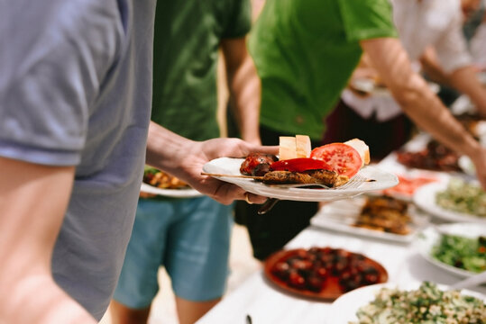 All you can eat BBQ buffet with people choosing their food