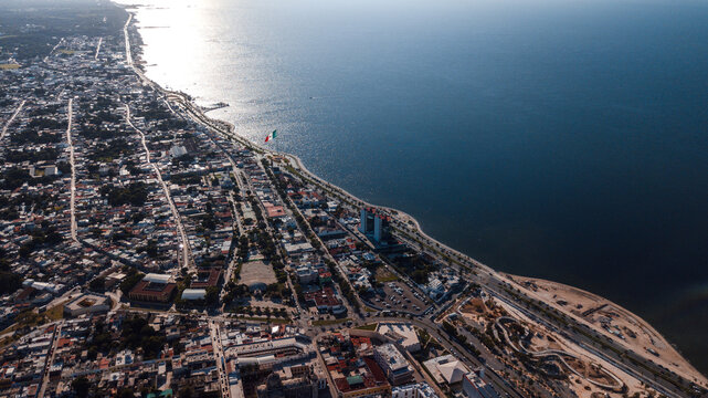 Mazatlan cityscape drone shot. Long embankment along the sea.