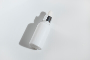 mockup of beauty fashion cosmetic makeup bottle serum dropper product with skincare healthcare concept on background