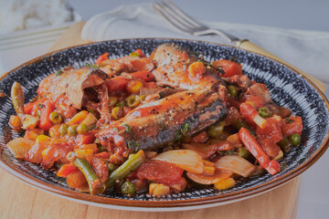 Healthy Indian fish curry shot close up.