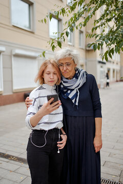 Active age ageless senior woman with daughter