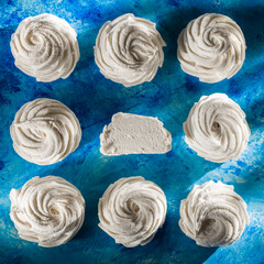 White Marshmallow On A Plate On A Sunny Day. Top View.