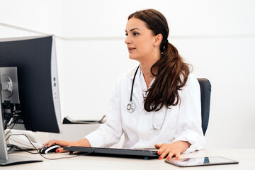 Female Doctor Using computer