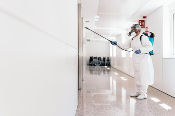 Worker Disinfecting Hospital