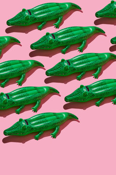 mosaic of some crocodile-shaped floaties