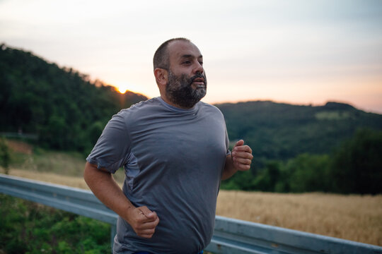 Man Running Outdoors
