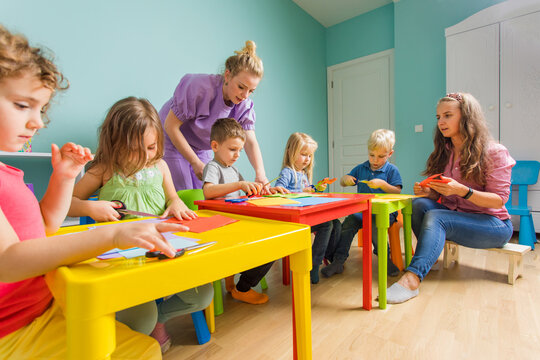 children and tutor study together at the creative school