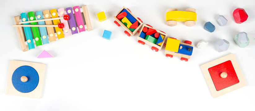 Baby Kid Toy Banner. Colorful Educational And Musical Toys On White Background. Top View, Flat Lay