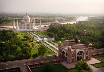 Taj Mahal as the day's first tourists trickle through the gates.