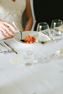 Serving food at the table of the bride