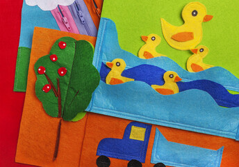 Background from soft felt of different colors. Part of the composition of a children's book from...
