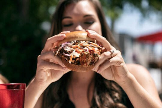 BBQ: Hungry Woman About To Eat Giant Pulled Pork Sandwich