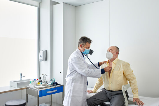 Doctor examining a man
