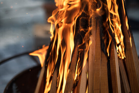 Lighting of a backyard bonfire
