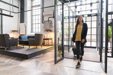 Female Traveller Entering In The Hotel