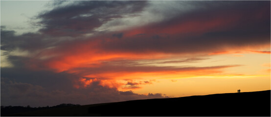 couple at sunset enjoying the view
