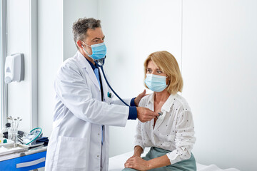 Doctor examining a woman