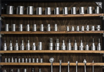 Neatly sorted hand tools in a workshop. 
