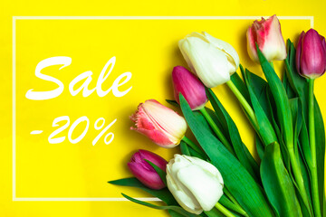 Baner for the site with the inscription discount. Spring sale. Tulips on a yellow background.  Poster design.